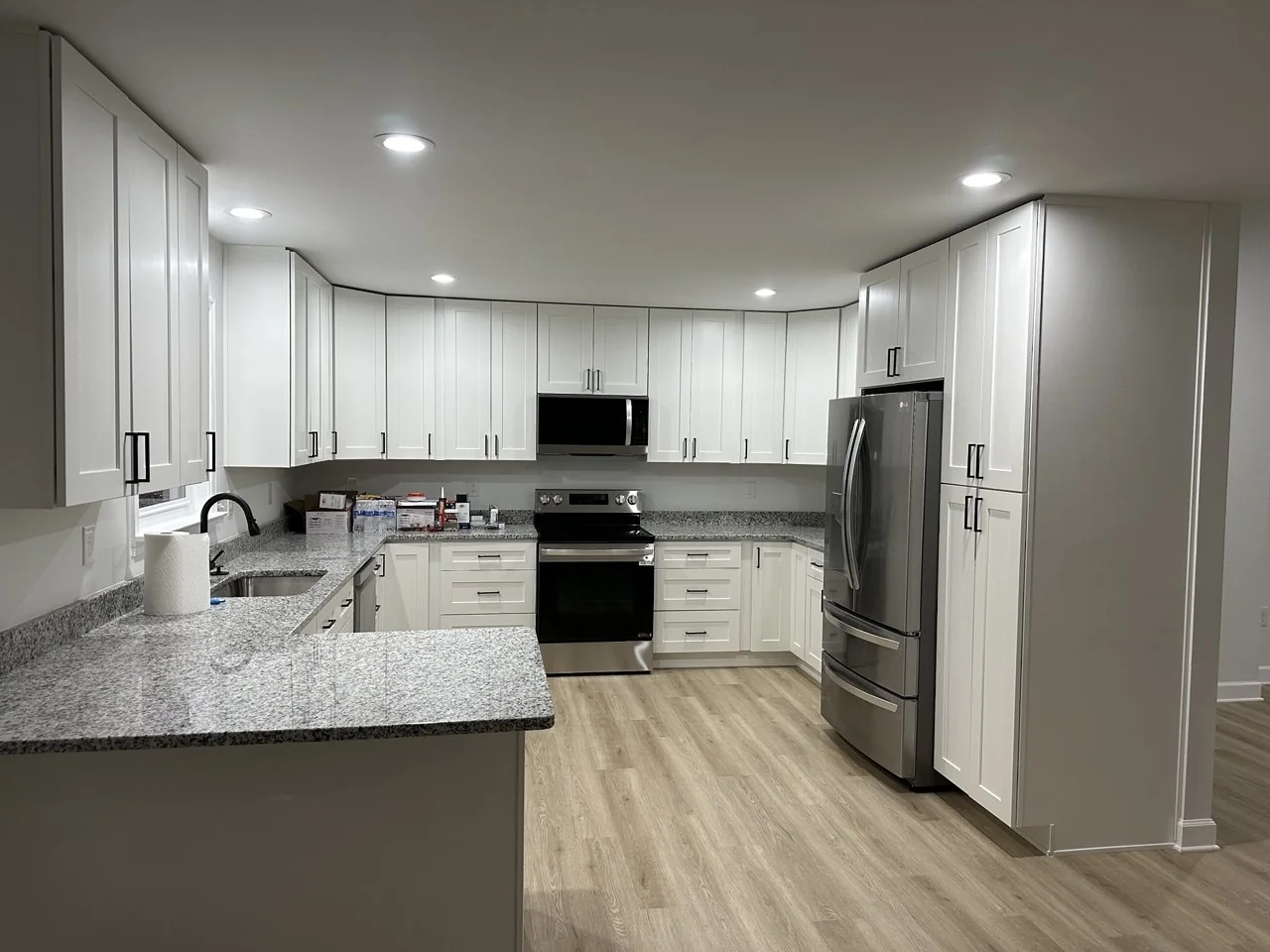 Detailed view of finished white cabinets